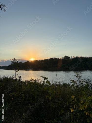 scenic view of a sunrise over a river