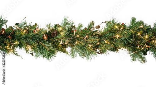 Elegant pine garland with warm string lights for festive holiday