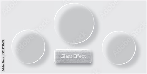 Glass morphism design elements with circular shapes and a rectangular button on a light grey background.