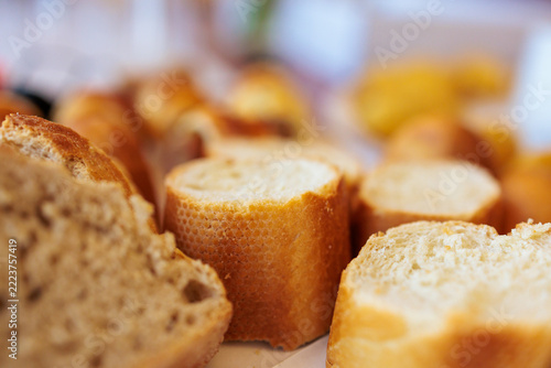 Sliced baguette with golden crust and visible bread crumb