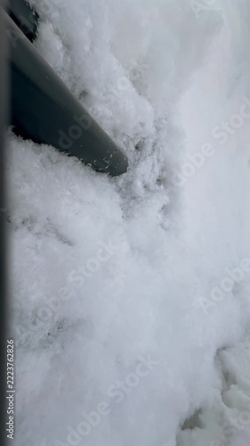 Camera on a snow shovel. 