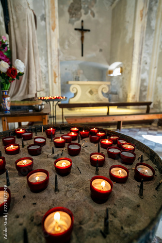 Votive Candles and Cross in Dubrovnik Chapel, Croatia
