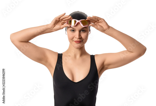 Swimming and fitness training, professional female swimmer wearing black swim...