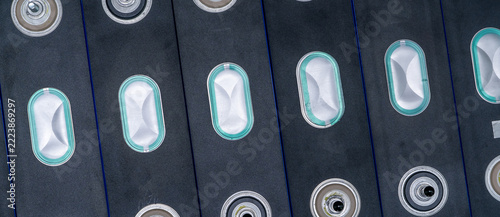 Obraz na plátně Close up of lithium ion NMC battery cells inside an electric vehicle battery pack, showing high voltage automotive energy storage technology used to power modern EV transportation and mobility
