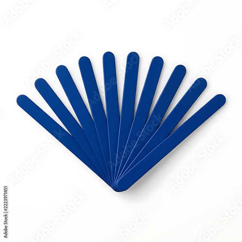 Set of blue painted wooden ice cream sticks arranged in a fan shape