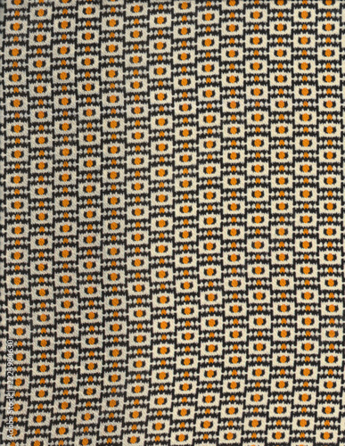 fabric with black and yellow squares pattern. african american background pattern