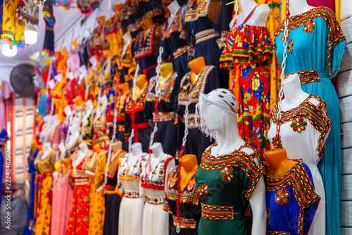 Summer wardrobe: women dresses on mannequins in a clothing store. Creative concept for an Algerian women clothing showroom