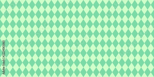 Seamless argyle pattern with mint and light green diamond shapes. Geometric background for fabric, wallpaper, and wrapping paper.