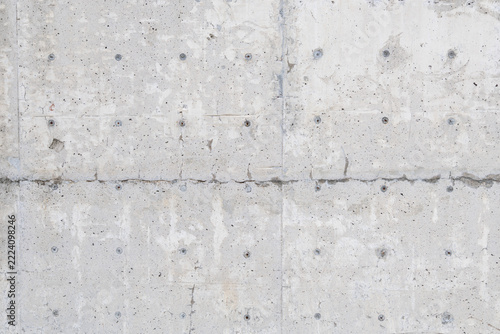 Light Grey Weathered Concrete Wall Texture Background with Natural Stains, Pores and Construction Marks
