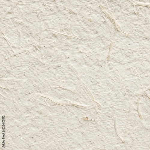 Natural handmade paper texture with visible fibers during soft daylight for artisanal crafts and stationery design