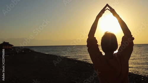Tree pose on the beach at sunrise yoga at sunrise