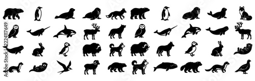 Diverse arctic and forest animal silhouettes arranged on a white background