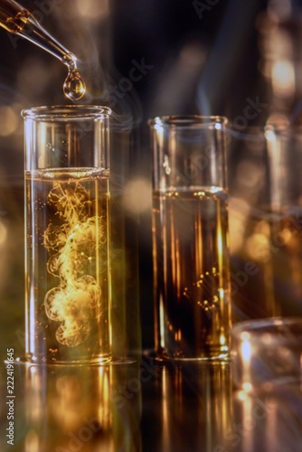 Blurred Abstract Biotechnology Laboratory with Pipette and Glassware
