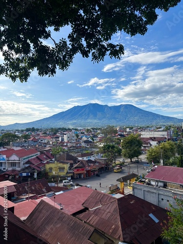 view of the city of BUKITTINGGI indonesia with marapi mountain west sumatera