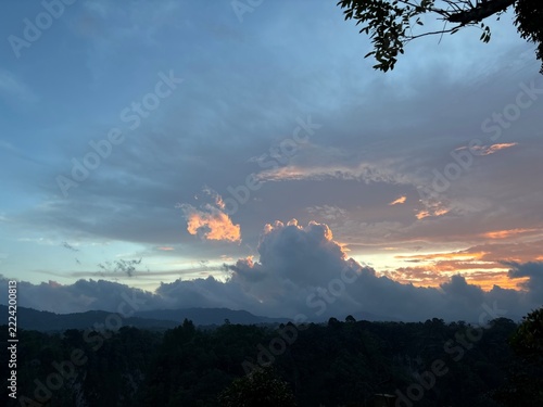 Beautiful sunset orange sky with clouds and blue sky