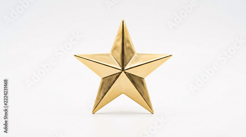 Shiny golden star symbol isolated on a clean minimalist white background design element.