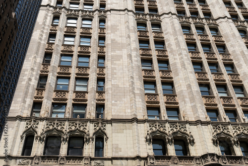 2019 New York City USA; Detailed view of the ornate neo-Gothic terra-cotta facade and gothic window details of the Woolworth Building, Lower Manhattan