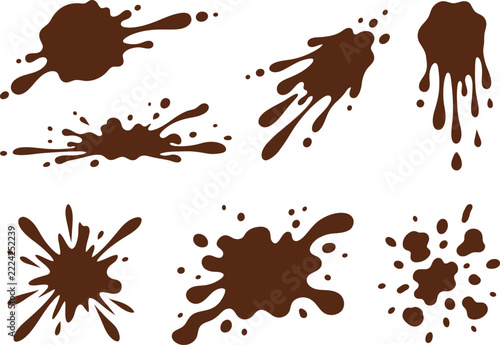 Set of abstract chocolate or mud splashes and liquid splatters isolated on white background