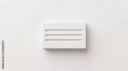 Minimalist Top-Down View of a White Rectangular Object with Three Horizontal Grooves on a Clean White Background, Representing Modern Industrial Design and Simple Geometric Aesthetics