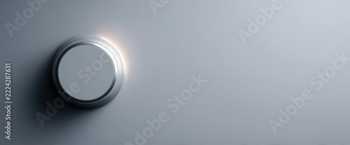 Minimalist metallic round object on surface