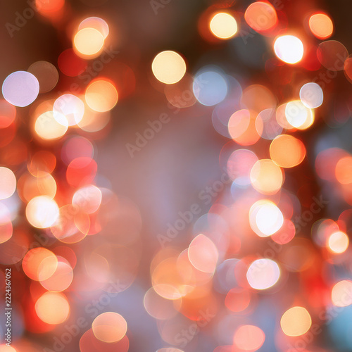 Christmas background, dreamy blurred fairy lights background in multicolor warm tones, soft dreamy photographic style, bokeh concentrated at the edges, clean center 