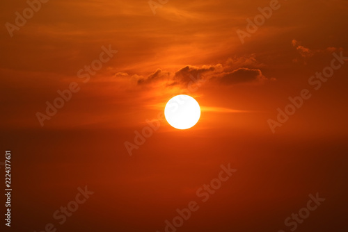 sunset on red orange sky back soft evening cloud over space