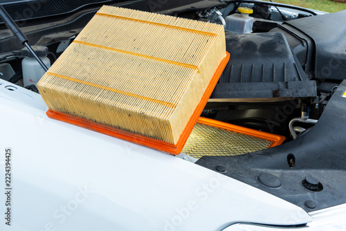 Dirty air filter rests atop engine bay