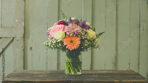 Floral bouquet in glass vase for wedding celebration or romantic