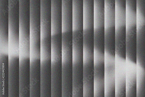 Abstract monochrome vertical panels with grainy silver texture and soft horizontal light effect for modern architectural design