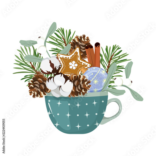 Christmas winter composition in a blue mug with pine branches, pinecones, cotton flowers, mistletoe, cinnamon sticks, a gingerbread star cookie, and a Christmas ball ornament.