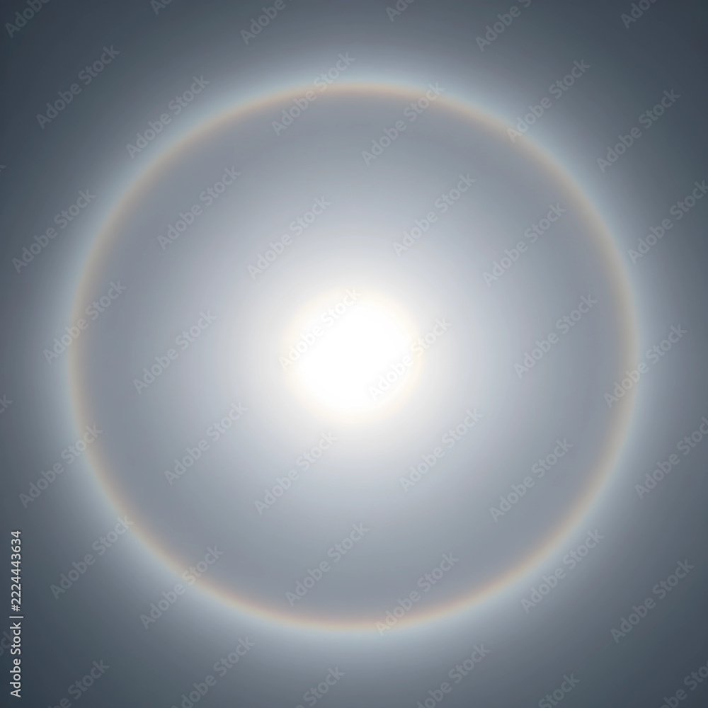 Naklejka premium Sun halo atmospheric phenomenon, circular rainbow around the sun in the sky, meteorological event and optical illusion in nature