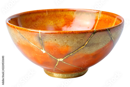 elegant kintsugi ceramic orange bowl with gold line textures on transparent background

