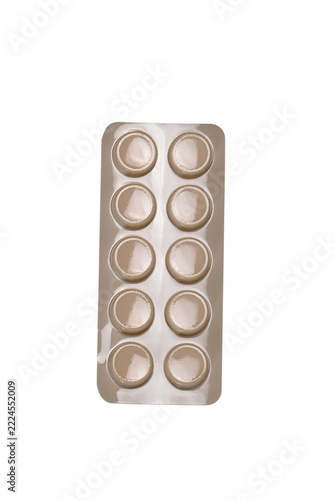 Blister pack containing ten round tablets in sealed pharmaceutical packaging isolated on a transparent background