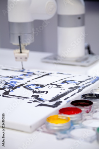 A painting being created by a robotic manipulator
