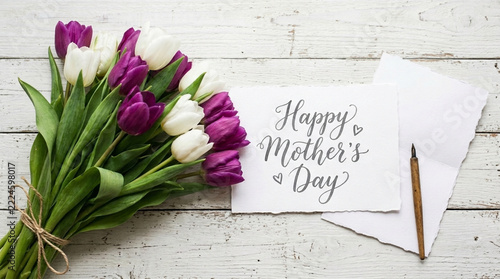Beautiful Tulips and Happy Mothers Day Card with Pen on Rustic White Wood Background