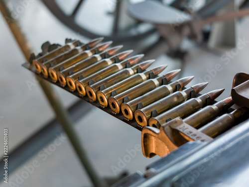 Netherlands - 10 september 2026, Soesterberg: Linked Ammunition Bullets Line in Museum Exhibit
