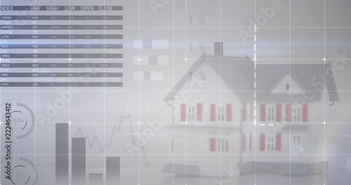 Displaying scale model house sitting on reflective surface in studio with translucent grid overlay