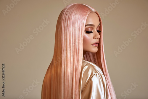 Refined fashion beauty photography with rose gold hair, minimalist makeup and a luxurious neutral palette for salon and cosmetics branding.