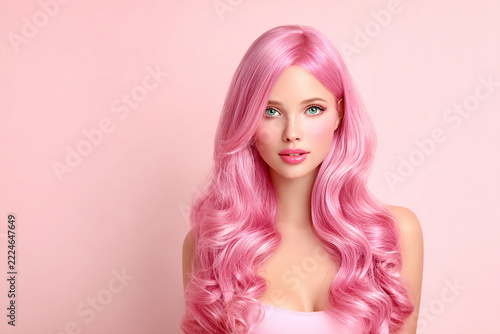 Modern feminine beauty photography showcasing pastel pink dyed hair, luminous skin and elegant styling for haircare advertising and editorial projects.