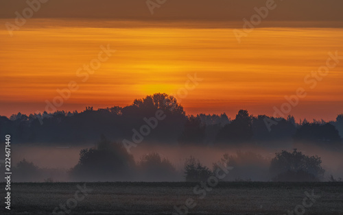 Fields covered in fog in Kernave, Lithuania