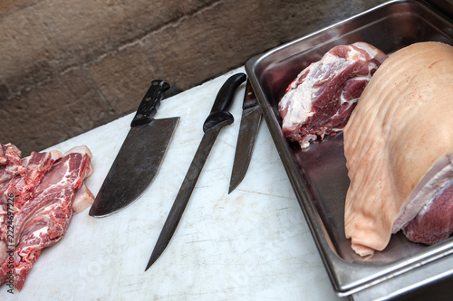 Butchering a pig in a butcher shop