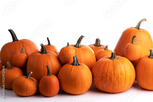 Flat lay arrangement with pumpkins on wooden background