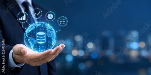 Suited person holding a database globe beneath analytical controls with blue ...