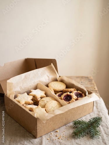 Rustic wooden box filled with homemade baked pastries and treats