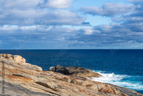 Outdoor scene showing the Blowholes in Torndirrup National park, a beautiful beach in Western Australia.