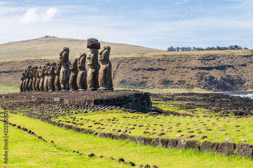Outdoor scene showing the Ahu Tongariki architectural site, home of 15 moai statues on easter island.