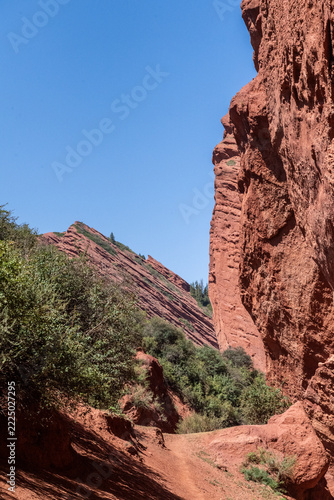 Outdoor scene showing the red rocks near the seven bulls area, close ro Dzhetyoguz in the high mountains of northern Kirgizstan.