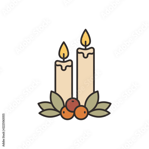 Two lit Christmas candles with berries and leaves