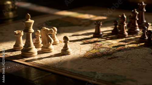 Chess Pieces on World Map Geopolitical Strategy Concept - Dramatic Side Light