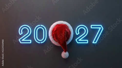 Happy New Year 2027 concept featuring glowing blue neon numbers and a red Santa Claus hat on a dark gray background, overhead view for holiday greeting cards and seasonal celebrations.